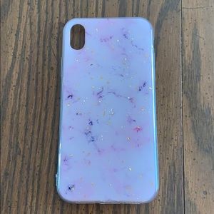 I am selling a iPhone XR it is a pinkesh with gold